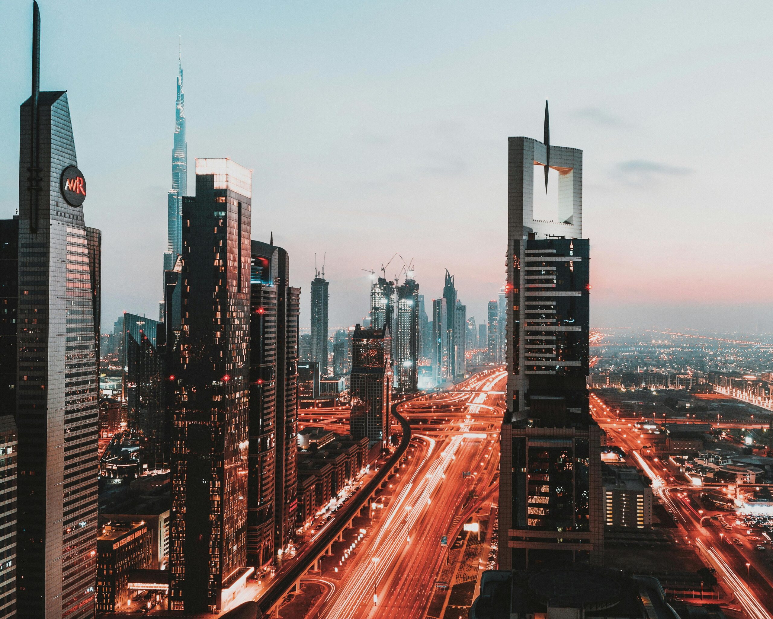 time-lapse-photography-of-passing-vehicles-on-city-roads